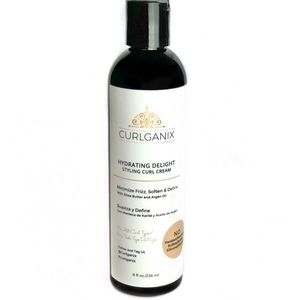 Curlganix cream and Denman inspired brush/black